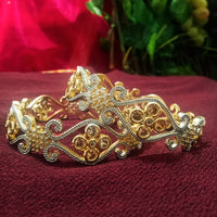 B0161_Gorgeous crafted bangles with floral design studded with American Diamond stones.
