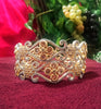 B0161_Gorgeous crafted bangles with floral design studded with American Diamond stones.