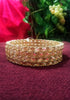 B0162_Gorgeous Golden crafted bangles with a touch of  American Diamond stones.