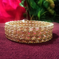 B0162_Gorgeous Golden crafted bangles with a touch of  American Diamond stones.