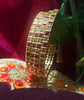 B0165_Elegant Golden bangles studded with a touch of pink ruby stones and American Diamond stones.