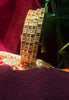 B0165_Elegant Golden bangles studded with a touch of pink ruby stones and American Diamond stones.