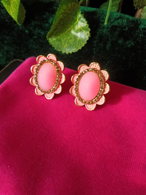 E0559_ Lovely oval shaped flower design studs with a touch of stones