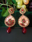 E0563_ Gorgeous Golden danglers with beautiful designs with a touch of beads (long hanging)