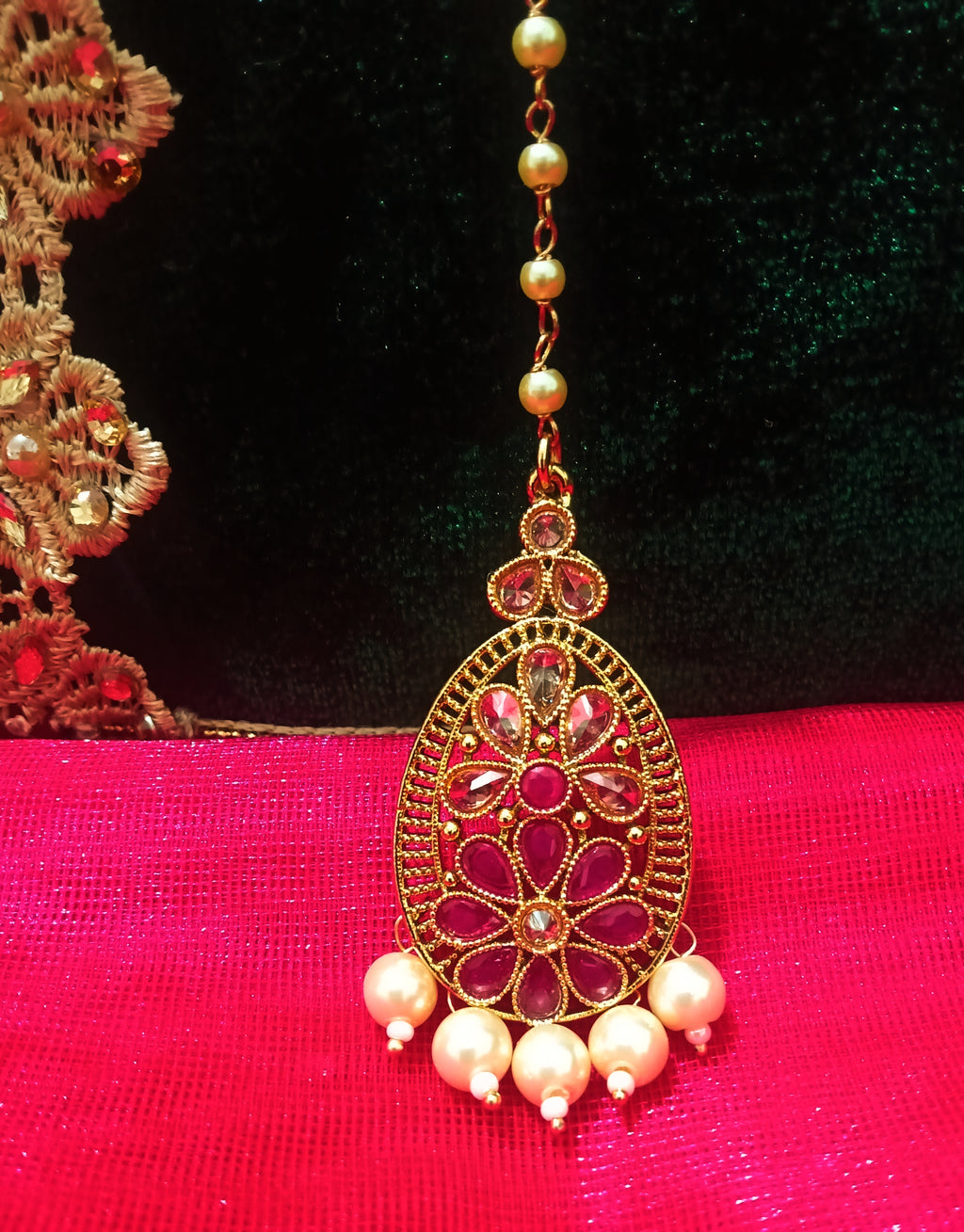 M05_Gorgeous American diamond studded Gold base color Maang Tika.