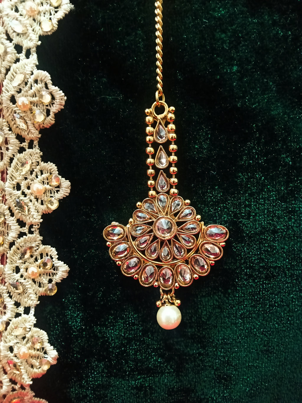 M04_Gorgeous American diamond studded Gold base color Maang Tika.