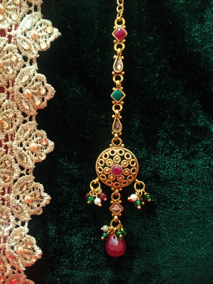 M07_Gorgeous Pink & Green ruby stone studded Gold base color Maang Tika with touch of beads.