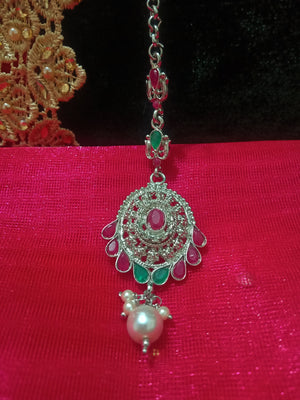 M08_Gorgeous Pink & Green ruby stone studded silver base color Maang Tika with touch of pearls.