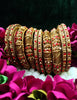 B0167_Gorgeous traditional style Matte finish designer golden bangle set studded with semi precious red & golden stones.