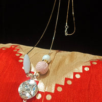N0258_Trendy long dazzling stone work necklace with a touch of lovely beads with a woolen ball along with a sleek chain.