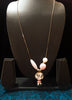 N0258_Trendy long dazzling stone work necklace with a touch of lovely beads with a woolen ball along with a sleek chain.