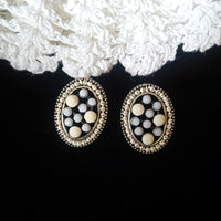 E0575_Classy oval shaped studs with a touch of stones.