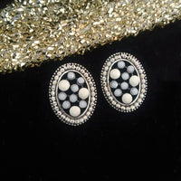 E0575_Classy oval shaped studs with a touch of stones.