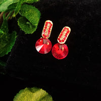 E0594_Lovely Stone work studs with a dazzling over sized red stone.