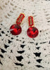 E0594_Lovely Stone work studs with a dazzling over sized red stone.