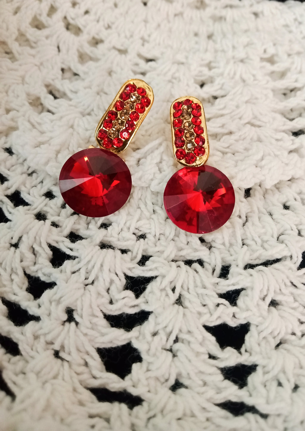E0594_Lovely Stone work studs with a dazzling over sized red stone.