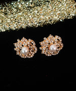 E0601_Lovely golden color flower design earrings embellished with stones with a touch of pearls.