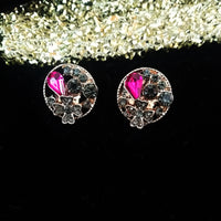 E0603_Classy circular shaped studs with a touch of pink and black stones.