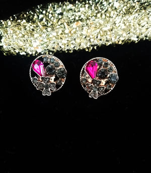 E0603_Classy circular shaped studs with a touch of pink and black stones.