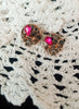 E0603_Classy circular shaped studs with a touch of pink and black stones.
