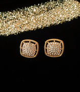 E0605_Classy square shaped golden tone studs with a touch of stones.