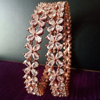 B0173_S_Elegant Rose gold flower design crafted bangles studded with American Diamond stones.