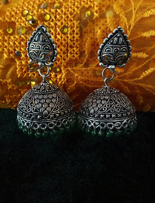 E0608_Gorgeous German Silver oxidized crafted jumkas with delicate design with a touch of green color bead drops (medium size).