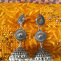 E0613_Beautiful German Silver oxidized crafted peacock design danglers along with a jumka drop with a touch of beads (long hangings).