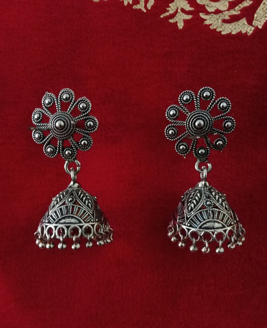E0618_Lovely German Silver oxidized crafted jumkas with flower design with a touch of bead drops(ear drop hangings).