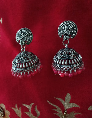E0622_Classy German Silver oxidized crafted jumkas with beautiful design along with pink bead drops (Medium size).