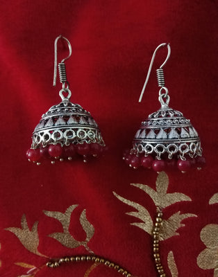 E0624_Classy German Silver oxidized crafted jumkas along with red bead drops (Medium size)