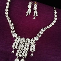 N0257_Beguiling crafted necklace set embellished with American Diamond stones with delicate stone work along with Chain drop pattern of stones.