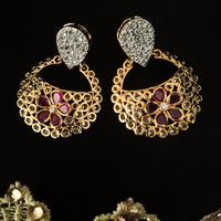 E0645_Classy ring shaped earrings with delicate stone work of American Diamond stones with a touch of pink stones.