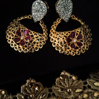 E0645_Classy ring shaped earrings with delicate stone work of American Diamond stones with a touch of pink stones.