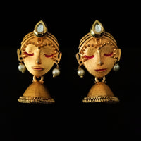 E0635_Beautiful crafted women face embossed earrings with a touch of stones.