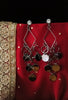 E0649_Trendy designer diamond shaped danglers with a touch of shiny disc shaped ring patterns & stone work.