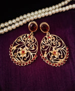 E0651_Classic golden color earrings studded with red stones with delicate craft work.