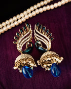 E0654_Gorgeous Crafted peacock design bead work jumkas embellished with stones with a touch of blue bead drop.