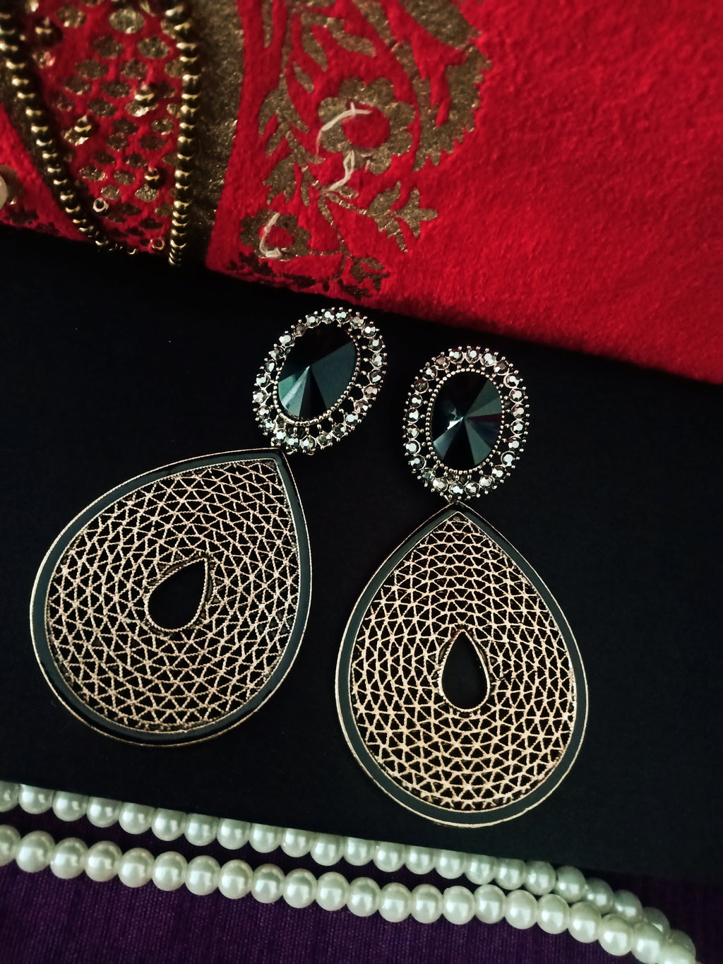 E0656_Classic crafted earrings with delicate craft work with a touch of stones.
