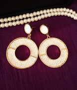 E0658_Classic knitted white earrings with delicate craft work.