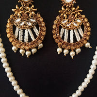 E0689_Gorgeous grand earrings embellished with stones & with a touch of pearls & white beads.