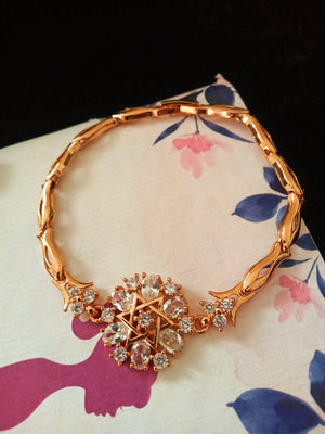 B0182_ Gorgeous golden base bracelet studded with semi precious stones with delicate work.