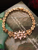 B0183_ Gorgeous golden base bracelet studded with semi precious stones with delicate work.