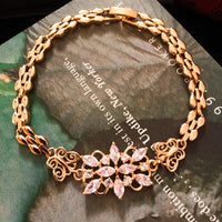B0183_ Gorgeous golden base bracelet studded with semi precious stones with delicate work.