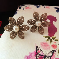 E0710_Lovely crafted flower design studs with delicate work with a touch of pearls.