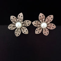 E0710_Lovely crafted flower design studs with delicate work with a touch of pearls.