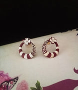 E0715_Classy crafted ring shaped earrings with a touch of flower design and stones.