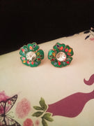 E0716_Gorgeous flower design studs with a touch of dazzling stones with delicate leaf designs.