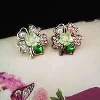 E0717_Lovely flower design studs with a touch of dazzling stones with delicate craft work.
