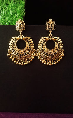 E0720_Gorgeous crafted german silver oxidized floral design ring shaped hangings with a touch of bead drops.